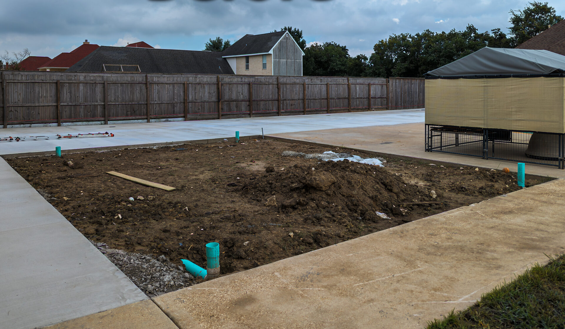 Port Arthur backyard, bare dirt before turf